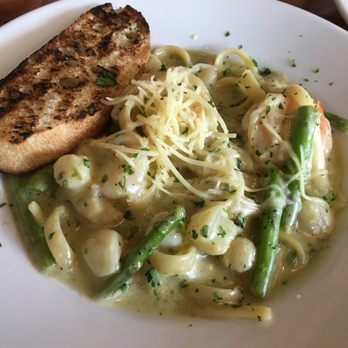 Jonah's Fish & Grits - Shrimp, scallop, asparagus pasta in creamy pesto sauce. Side of garlic bread. - Seafood Near Me - Thomasville, Georgia