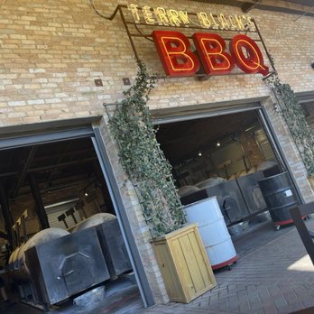 Terry Black's Barbecue - When you sit on the patio, you can see where the meat is being cooked. - Barbeque Near Me - Fort Worth, Texas