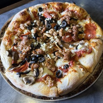 Roma II Pizzeria - Combination pizza (minus salami, add garlic). - Pizza Near Me - Sacramento, California Roma II Pizzeria - Combination pizza (minus salami, add garlic). - Pizza Near Me - Sacramento, California