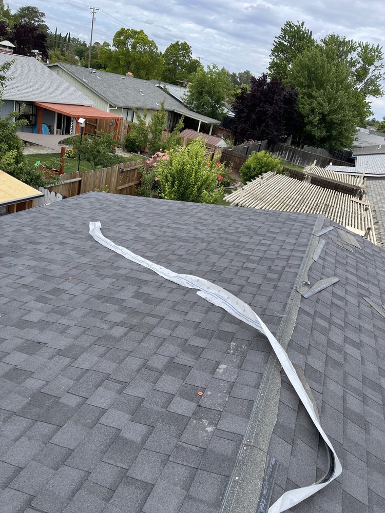 Slide of Roofing Pro's