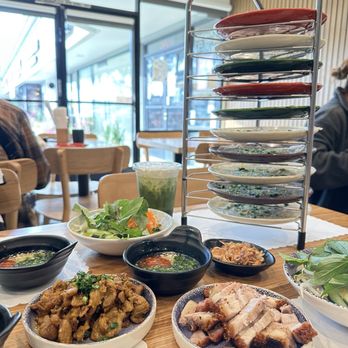Quan Nhii - The spread - #1 crispy pork belly #2 lemongrass pork banh uot - IG @bougiefoodieboi - Vietnamese Near Me - Westminster, California Quan Nhii - The spread - #1 crispy pork belly #2 lemongrass pork banh uot - IG @bougiefoodieboi - Vietnamese Near Me - Westminster, California