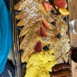 Tall City Bistro - À la carte selections served on a wooden platter. Delicious.