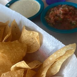 Complimentary tortilla chips and sauces