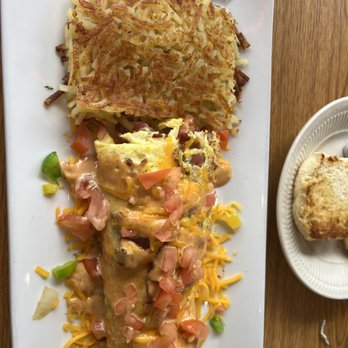 Sunny Side Up - Po-Boys Omelette with bacon and hashbrowns - Breakfast & Brunch Near Me - Elmwood, Louisiana Sunny Side Up - Po-Boys Omelette with bacon and hashbrowns - Breakfast & Brunch Near Me - Elmwood, Louisiana