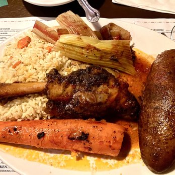 Beirut - Slow roasted lamb shank with vegetables, rice, and baked potato - Italian Near Me - Toledo, Ohio Beirut - Slow roasted lamb shank with vegetables, rice, and baked potato - Italian Near Me - Toledo, Ohio