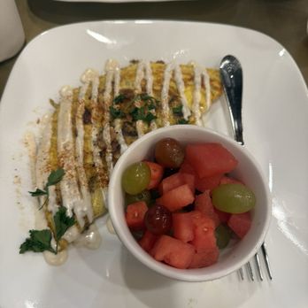 Fosko Coffee Barre - Omelette with chicken, peppers, and eggs topped with ranch drizzle and fruit cup - Coffee & Tea Near Me - Pensacola, Florida