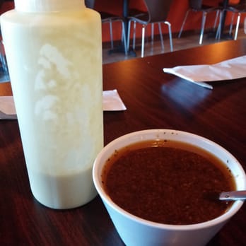 Solo Empanadas - The condiments.  These were the highlight of the meal. - Empanadas Near Me - McAllen, Texas