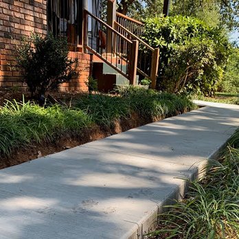 Precision Concrete - 270sqft U-Shaped walkway. Stamped by the customers Dog "Bowman" to show their Clemson Pride! - Masonry/Concrete Near Me Precision Concrete - 270sqft U-Shaped walkway. Stamped by the customers Dog "Bowman" to show their Clemson Pride! - Masonry/Concrete Near Me