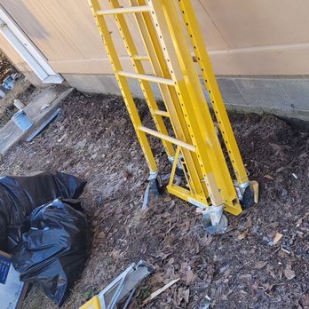 R&W Repairs & Renovations - a ladder leaning against a house - Roofing Near Me