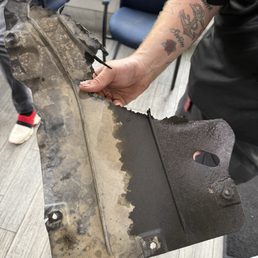 Oil pan destroyed showing oil drip proof