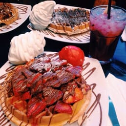Strawberry haven waffle with red velvet gelato and a strawberry mojito Strawberry haven waffle with red velvet gelato and a strawberry mojito