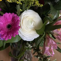 Enchanting Florist & Gift Shop - A mesmerizing white rose with a beautiful aroma!!