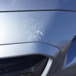 Damage done to my car's clear bra by the car wash.