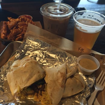 Heritage Eats - Cowboy style, err I mean..... Cowboy Steak Wrap.  With Pineapple Habanero sauce (a must)!  Vietnamese Ice Coffee for me, beer for him. - Salad Near Me - Napa, California