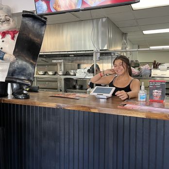 Good Fellas Pizza - Friendly hostess ready to take our order. Large pizza order of wings and antipasto salad. It was great! - Pizza Near Me - Whittier, California