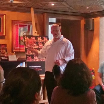 Hard Rock Cafe Amsterdam - Chef talking us through the World Burger Tasting Tour Event burger ingredients - American Near Me - Amsterdam, New Hampshire