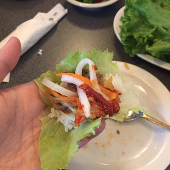 Korea Garden - A piece of lettuce, some rice, grilled meat, kimchi, radishes, and hot chili paste = the best bulgogi - Korean Near Me - Omaha, Nebraska Korea Garden - A piece of lettuce, some rice, grilled meat, kimchi, radishes, and hot chili paste = the best bulgogi - Korean Near Me - Omaha, Nebraska