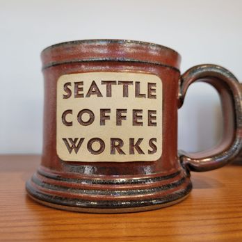 Victrola Coffee - Thomas - two coffee mugs on a table - Coffee & Tea Near Me - Seattle, Washington Victrola Coffee - Thomas - two coffee mugs on a table - Coffee & Tea Near Me - Seattle, Washington