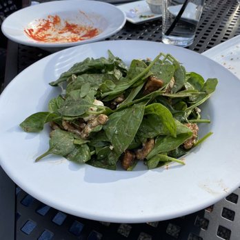 Happy Hour Bar and Grill - a plate of spinach salad - Sports Bars Near Me - Stroudsburg, Pennsylvania Happy Hour Bar and Grill - a plate of spinach salad - Sports Bars Near Me - Stroudsburg, Pennsylvania