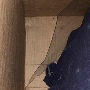 Madison Van Lines - Broken glass from five pieces of art, not wrapped, not protected. - Movers Near Me - Margate, Florida