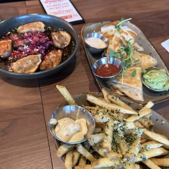 Tavern in the Square - Rosemary, Parmesan fries, chicken quesadillas, and crispy chicken dumplings - Sports Bars Near Me - Bedford, New Hampshire
