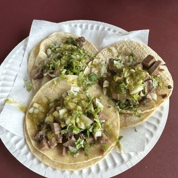 Los Primos Taqueria - three tacos on a paper plate - Mexican Near Me - Long Beach, California Los Primos Taqueria - three tacos on a paper plate - Mexican Near Me - Long Beach, California