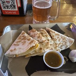 Jokers Icehouse Bar & Grill - Chicken quesadillas chased with Deep Ellum IPA