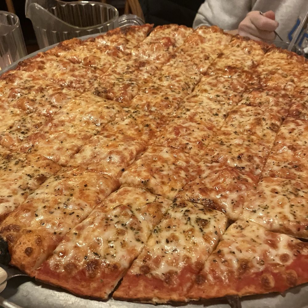 Monical's Pizza - Cheese thin pizza - Pizza Near Me - Manteno, Illinois Monical's Pizza - Cheese thin pizza - Pizza Near Me - Manteno, Illinois
