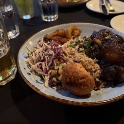 Calabash Bistro - Oxtail dinner with rice, coleslaw, plantain and coconut dumpling. Very tender oxtail