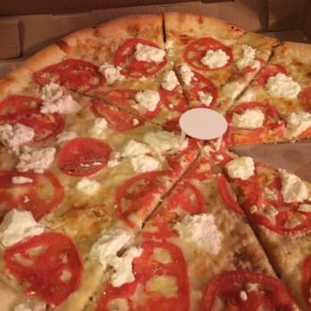 Sweet Willy's Pizzeria - White pizza with garlic, tomatoes and ricotta. - Pizza Near Me - Albany, New York Sweet Willy's Pizzeria - White pizza with garlic, tomatoes and ricotta. - Pizza Near Me - Albany, New York