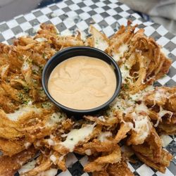 Santana & Mavericks Unique Crafted Foods - Blooming onion, awfully fried, but quite tasty