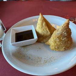 Clay Oven Indian Cuisine - Samosas: very good app. Filled with potatoes, spices and a mixed vegetable blend. The sauce is unique and makes the dish. 8.5/10.