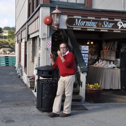 Following his own rules of "No Smoking". We walked back five minutes later and the "no smoking" signs were removed!