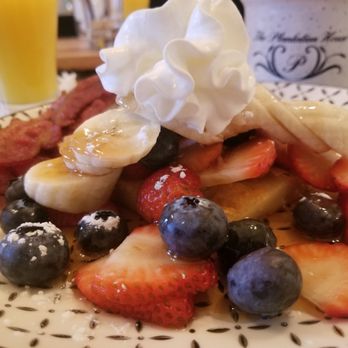 The Plantation House - Yummy! Yummy! German pancakes topped with strawberries, blueberries, bananas, whipped cream with a side of bacon. - Bed & Breakfast Near Me - Pflugerville, Texas The Plantation House - Yummy! Yummy! German pancakes topped with strawberries, blueberries, bananas, whipped cream with a side of bacon. - Bed & Breakfast Near Me - Pflugerville, Texas