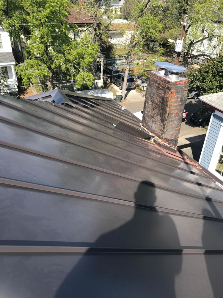 Slide of JCB Roofing