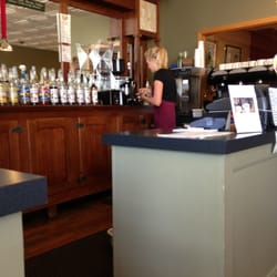 Java John's Coffee House - Barista making one of their specialties "Affogato".  Hot espresso poured over dense ice cream.