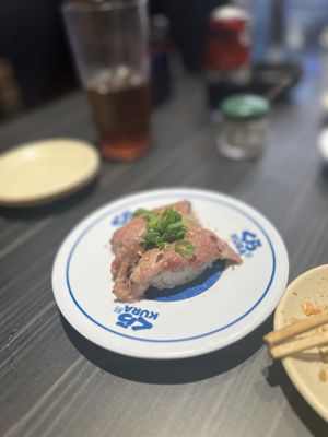 Kura Revolving Sushi Bar by null