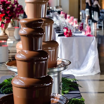 Yummie Fountains - a chocolate fountain at a wedding reception - Desserts Near Me Yummie Fountains - a chocolate fountain at a wedding reception - Desserts Near Me