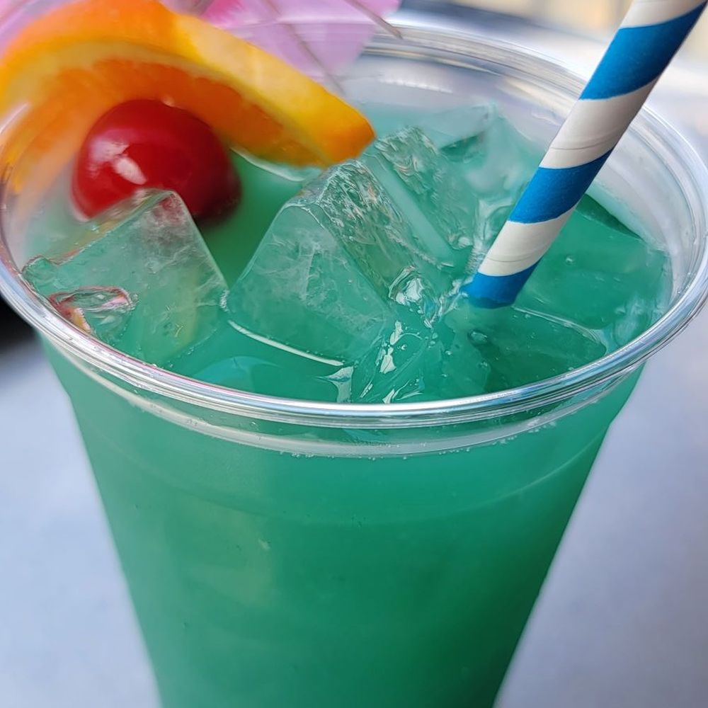 The Blu Moon Bistro - Mermaid water - New American Near Me - Ludington, Michigan