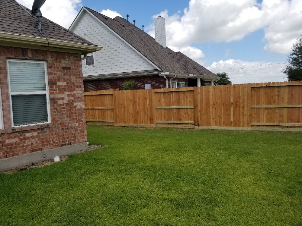 Slide of Pride of Texas Roof and Fence