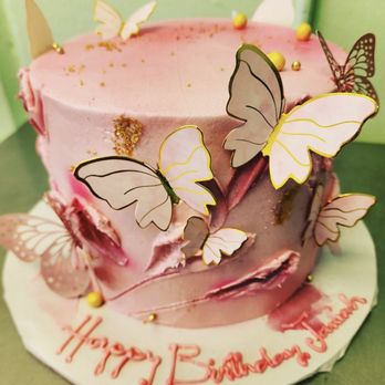 Cooper Street Bakery - a pink birthday cake decorated with butterflies - Bakeries Near Me - Arlington, Texas Cooper Street Bakery - a pink birthday cake decorated with butterflies - Bakeries Near Me - Arlington, Texas