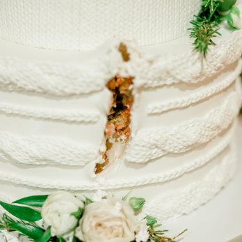 Tasty Bakery - a white wedding cake with a slice taken out of it - Desserts Near Me - Murrysville, Pennsylvania Tasty Bakery - a white wedding cake with a slice taken out of it - Desserts Near Me - Murrysville, Pennsylvania