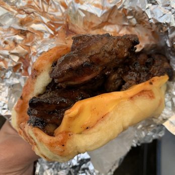Jamaican Flavors - Jerk Chicken on Coco Bread with Cheese - Bakeries Near Me - Jamaica, New York