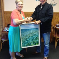 Cafe in Paradise - Francis Mesaros presenting me (Wanda) one of his original painting for my birthday December 2014! Thank you Francis!