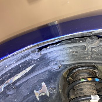 Brown & Brown Wholesale - Front driver side fender liner with hole from scraping - Car Dealers Near Me - Mesa, Arizona Brown & Brown Wholesale - Front driver side fender liner with hole from scraping - Car Dealers Near Me - Mesa, Arizona