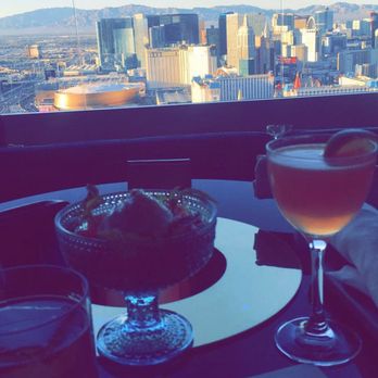Skyfall Panoramic Bar & Lounge - Old fashioned served with one jumbo ice cube and a crop top a specialty drink they have with a beautiful view. - Cocktail Bars Near Me - Las Vegas, Nevada Skyfall Panoramic Bar & Lounge - Old fashioned served with one jumbo ice cube and a crop top a specialty drink they have with a beautiful view. - Cocktail Bars Near Me - Las Vegas, Nevada