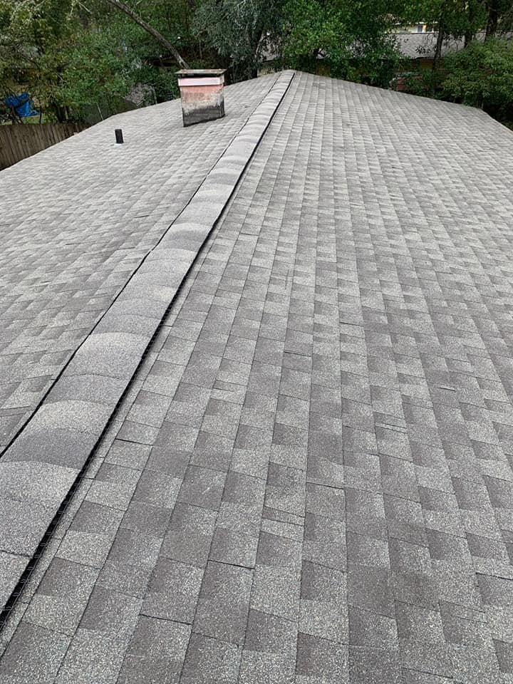 Slide of Apachee Roofing