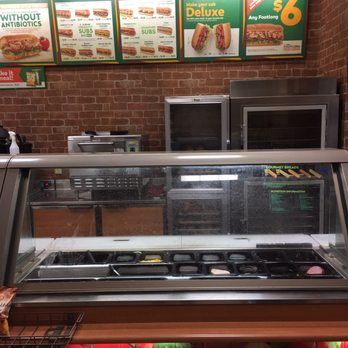 Subway - a display of hotdogs and other food items - Fast Food Near Me - Lonsdale, Arkansas