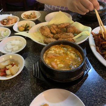 Stone Korean Restaurant - clockwise: fried chicken, spicy squid, seafood tofu soup - Korean Near Me - Redmond, Washington Stone Korean Restaurant - clockwise: fried chicken, spicy squid, seafood tofu soup - Korean Near Me - Redmond, Washington