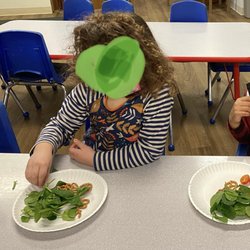 Center of Gravity - GL Campus - Actually reaching for spinach leaves at snack time!